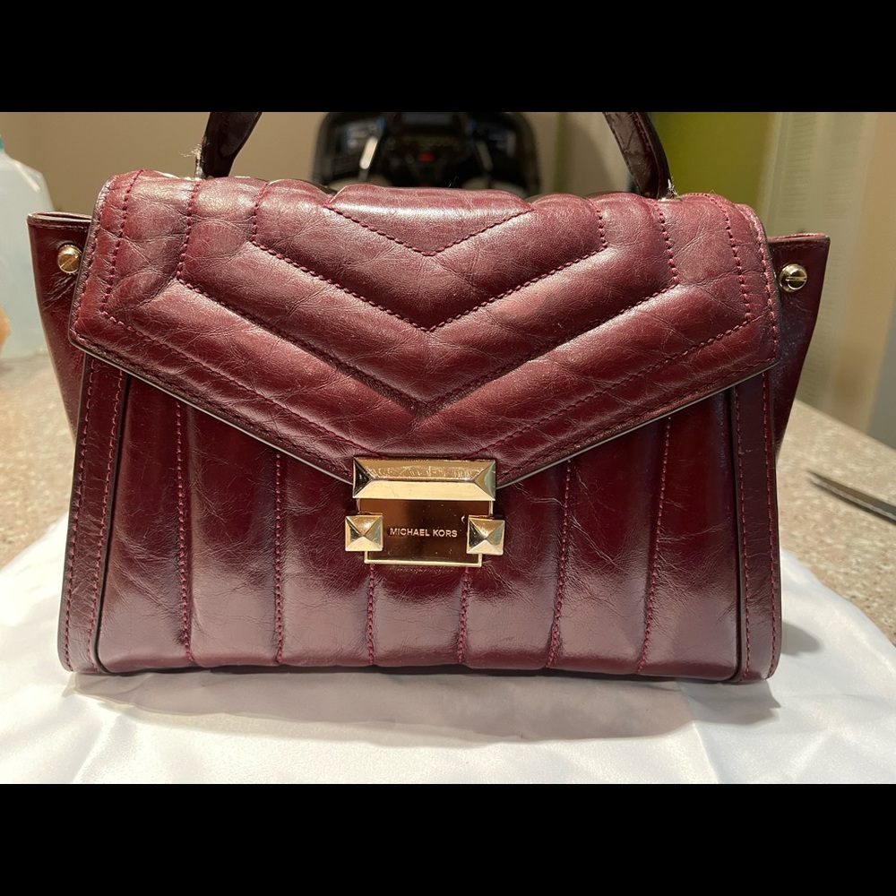 Burgundy Michael Kors bag and matching wallet. Perfect for fall!